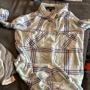 A blue dark blue and pink flannel from Derek heart